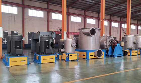 What are the causes of paper machine wear