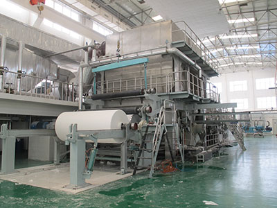 What are the raw materials for paper machine production?